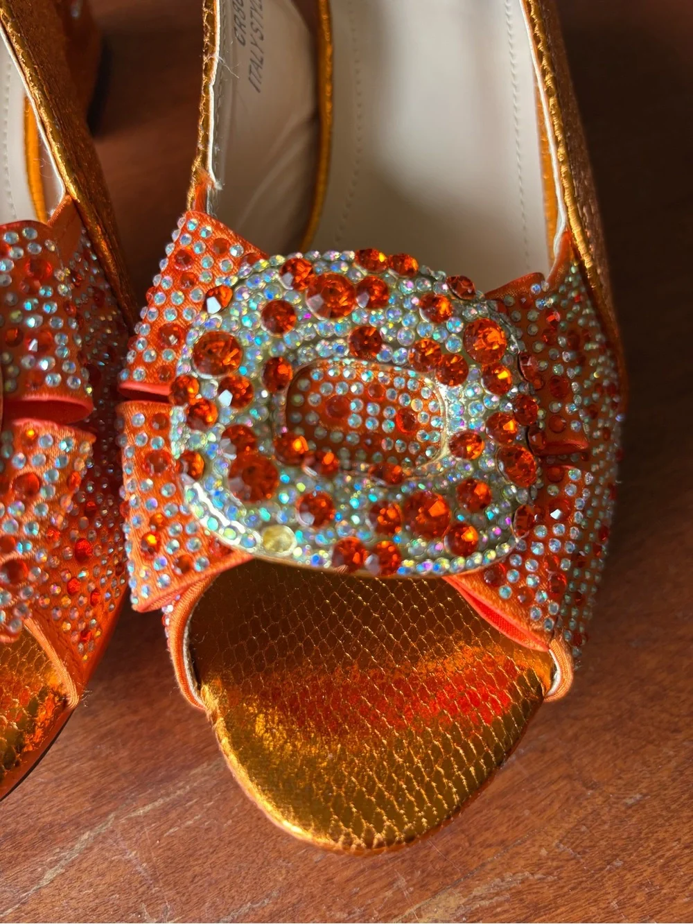Venus Chan slingback heels w vibrant crystal-encrusted ornament on the peep toe.